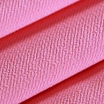 Tessuto Microfibra Crêpe Rosa in Poliestere per abbigliamento