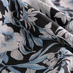 Toile de coton à motifs floraux imprimée sur fond noir | new tess
