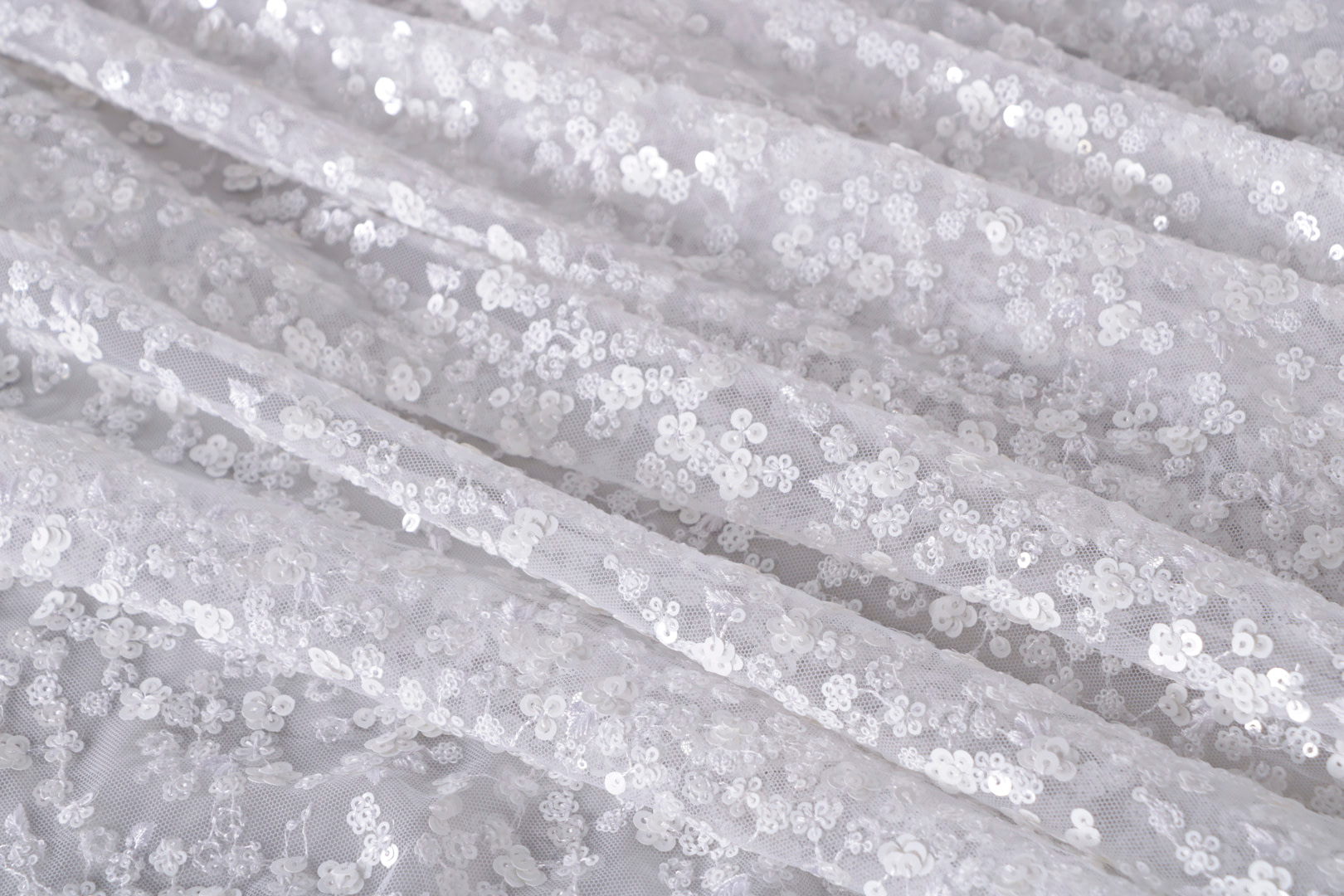 Tessuto Paillettes Bianco in Poliestere per Abbigliamento TC000929