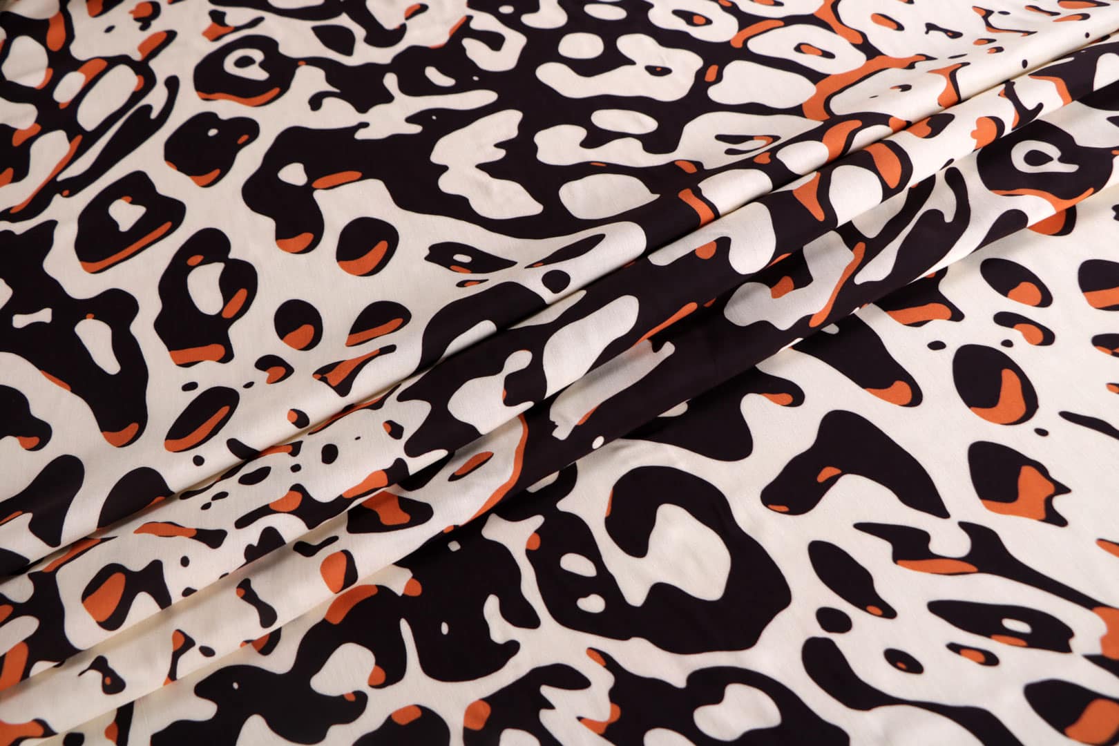 Beige, Black, Orange, White Viscose Muslin fabric for dressmaking