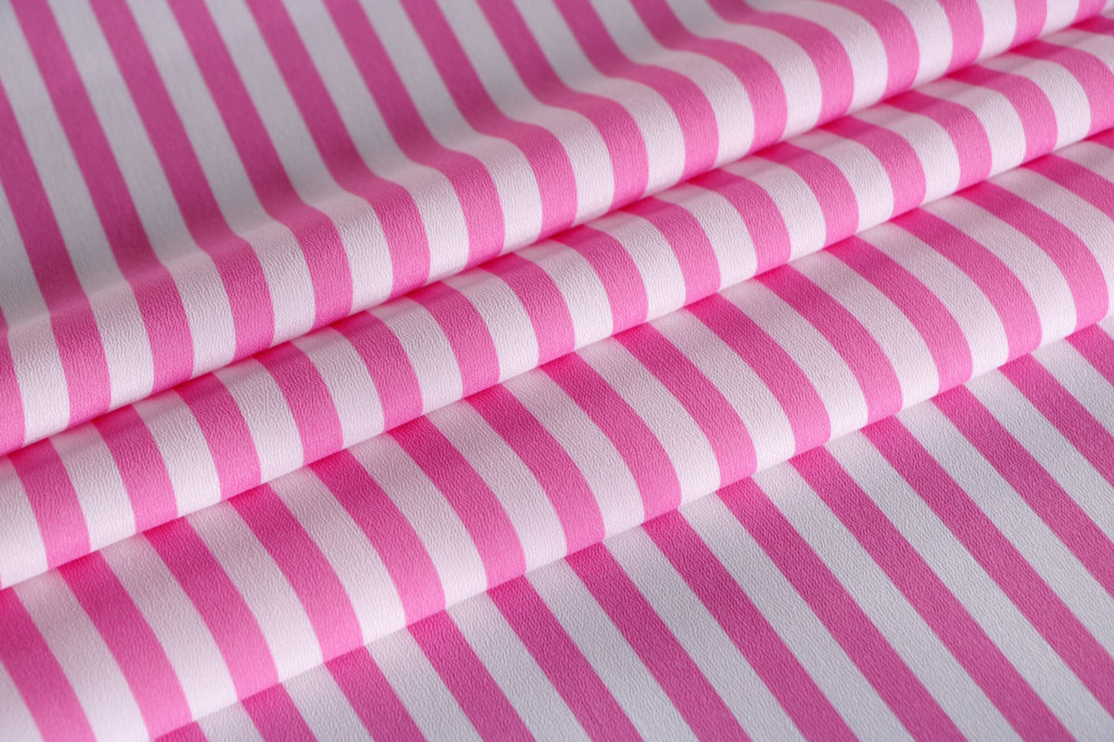Pink, White Viscose Crêpe de Chine fabric for dressmaking