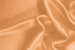 Tessuto Crêpe Satin Arancione Albicocca in Seta per Abbigliamento UN000155