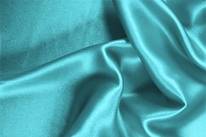 Tessuto Crêpe Satin Blu Onda in Seta per Abbigliamento UN000191