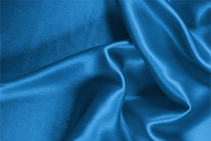 Tessuto Crêpe Satin Blu Portofino in Seta per Abbigliamento UN000189