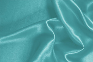 Tessuto Crêpe Satin Blu Hawaii in Seta per Abbigliamento UN000190