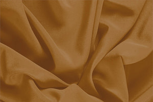 Tessuto Crêpe de Chine Marrone Caramel in Seta per abbigliamento