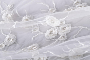 White embroidered tulle with ramage pattern | new tess bridal fabrics