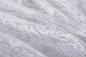 Dentelle avec double feston et motif floral | new tess