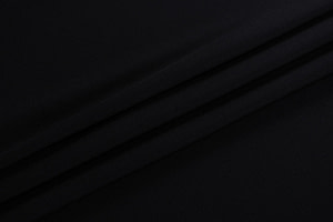 Black organic wool crêpe fabric for dressmaking