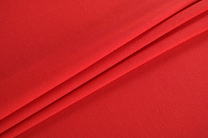 Red organic wool crêpe fabric for dressmaking
