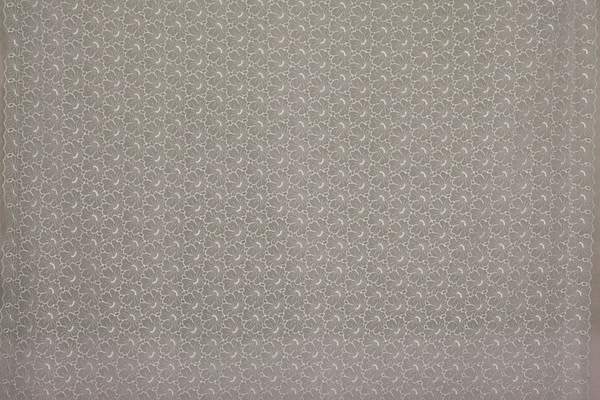 Tessuto Tulle Ricamato 001 Bianco in Poliestere