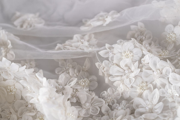 Ivory tulle with organza flowers | new tess bridal fabrics
