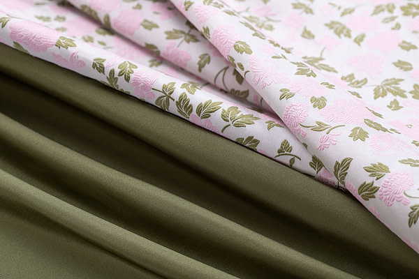 Pink and green floral brocade and moss green silk faille fabric | new tess