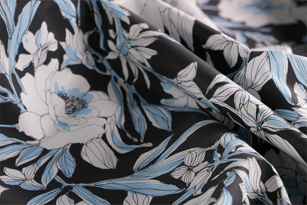 Tessuto floreale in tela di cotone stampato su base nera | new tess