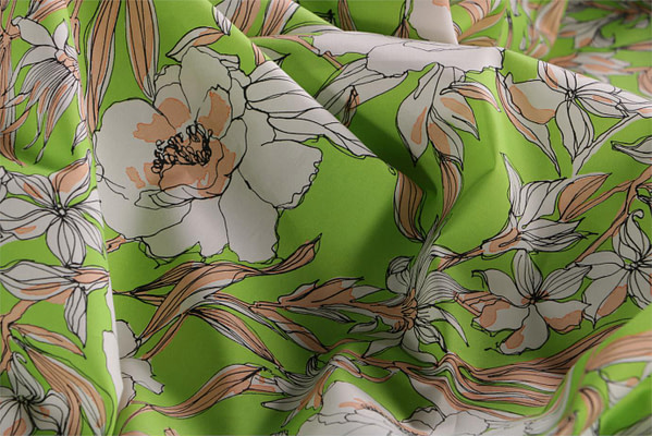 Tessuto floreale in tela di cotone stampato su base verde | new tess