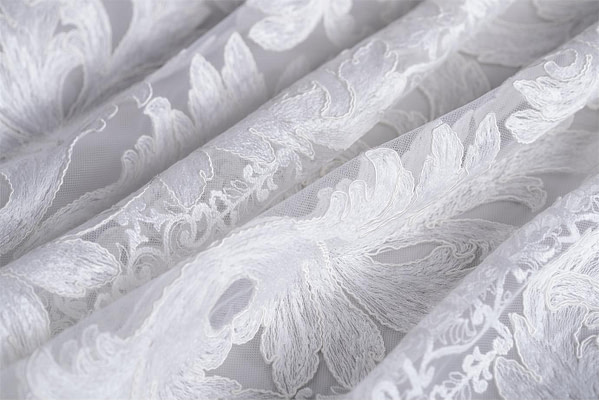 White rebrodé embroidery | new tess bridal fabrics