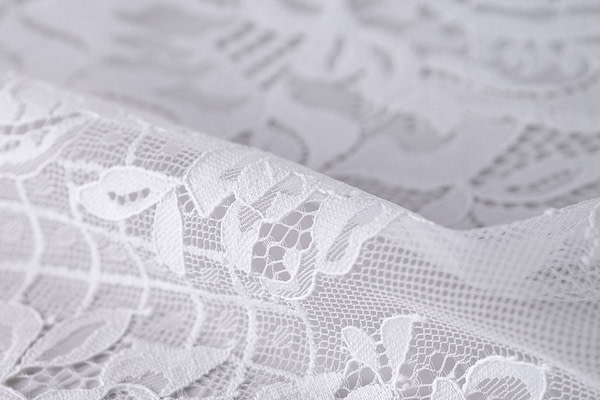 Dentelle avec double feston et motif floral | new tess