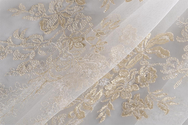 Luxurious gold embroidered tulle | new tess bridal fabrics