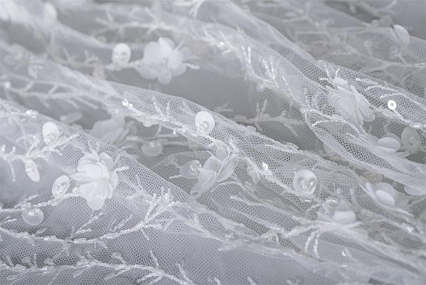 Tulle fabric with floral applications | new tess bridal fabrics