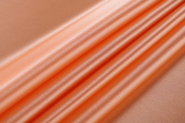 Apricot orange crêpe back satin fabric in pure silk | new tess
