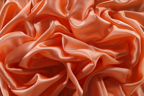 Apricot orange crêpe back satin fabric in pure silk | new tess