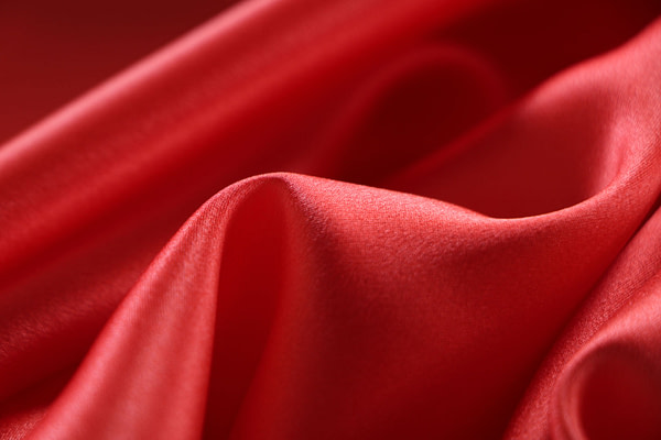 Tomato orange crêpe back satin fabric in pure silk | new tess