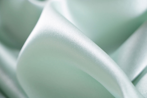 Chlorophyll green crêpe back satin fabric | new tess