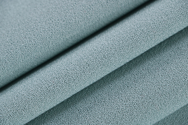 Opal blue wool crêpe fabric | new tess