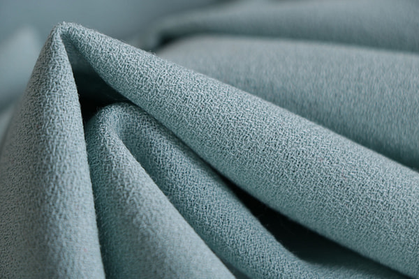 Opal blue wool crêpe fabric | new tess
