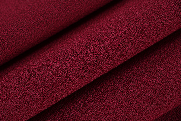 Ruby red wool crêpe fabric | new tess