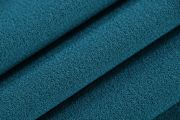Peacock blue wool crêpe fabric | new tess