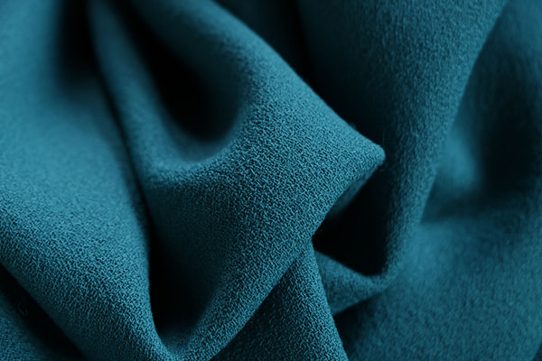 Peacock blue wool crêpe fabric | new tess