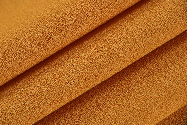 Ochre yellow wool crêpe fabric | new tess