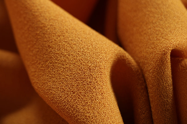 Ochre yellow wool crêpe fabric | new tess