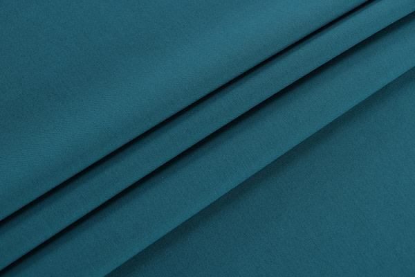 Peacock blue stretch wool gabardine fabric | new tess