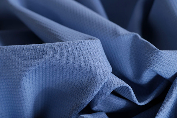 Light blue stretch cotton piqué fabric | new tess
