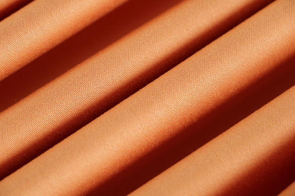 Saffron orange stretch cotton satin fabric | new tess