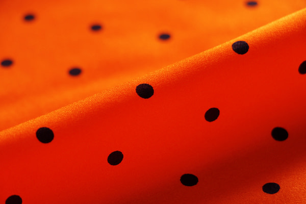 Orange polka dot silk satin fabric | new tess