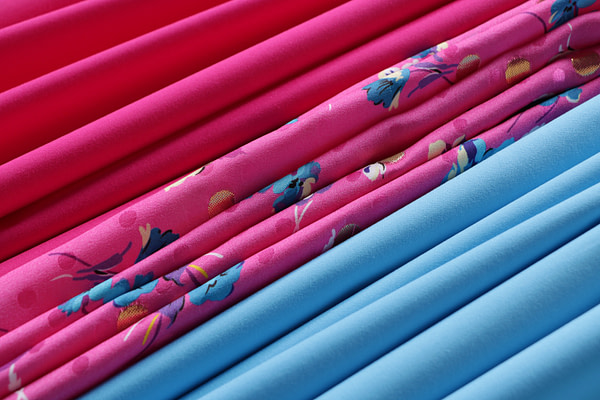 Floral fuchsia silk jacquard fabric paired with cotton sateen fabrics - new tess