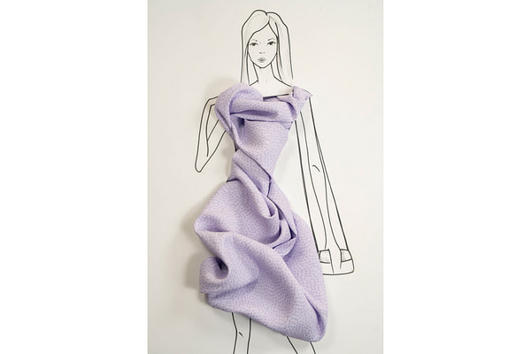 Viscose fabric with an embossed polka dot pattern in lilac | new tess