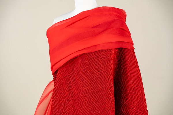 Embossed wool and silk fabric in a vibrant deep red shade | new tess