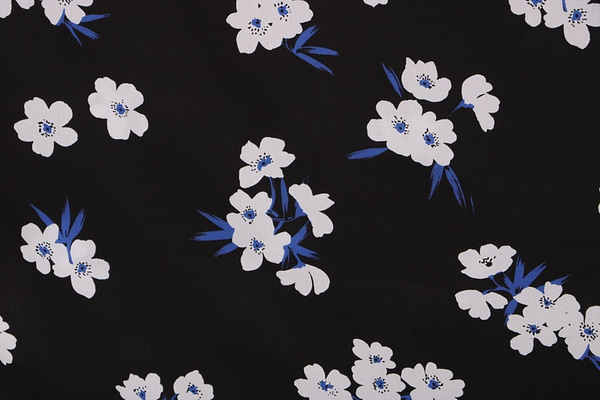 Tessuto floreale in popeline di cotone stampato su fondo nero | new te