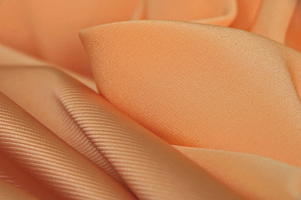 Apricot silk dogaressa and crepe de chine fabric for dressmaking | new tess