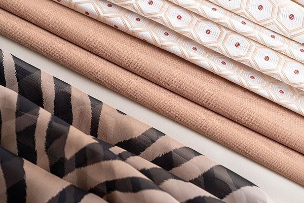 Fine beige fabrics for high fashion and dressmaking | new tess