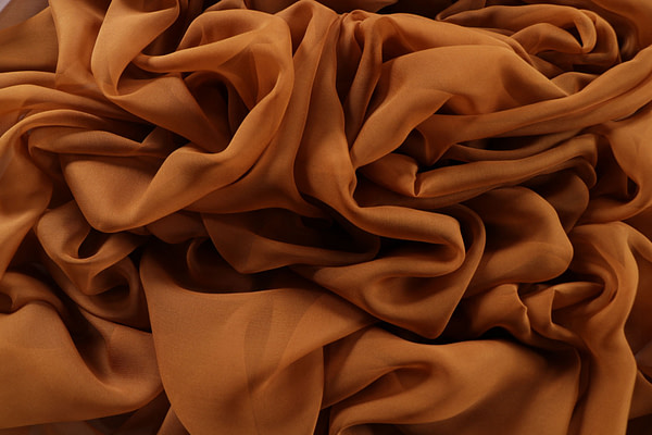 Caramel brown chiffon fabric in pure silk | new tess
