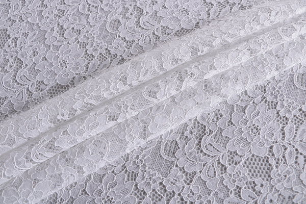 Bridal rebrodé lace fabric in white with double scalloping