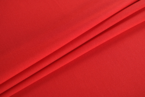 Tessuto crepella di lana biologica rosso | new tess