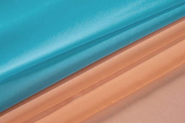 Peach and wave blue silk chiffon fabric for dressmaking and couture | new tess