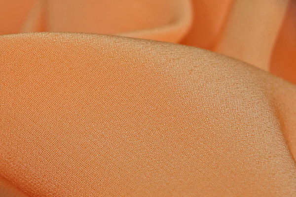 Apricot orange crêpe de chine fabric | new tess