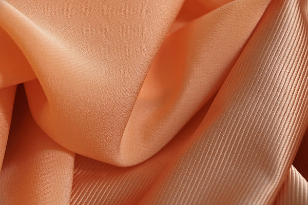 Apricot orange silk crêpe de chine and dogaressa fabric | new tess